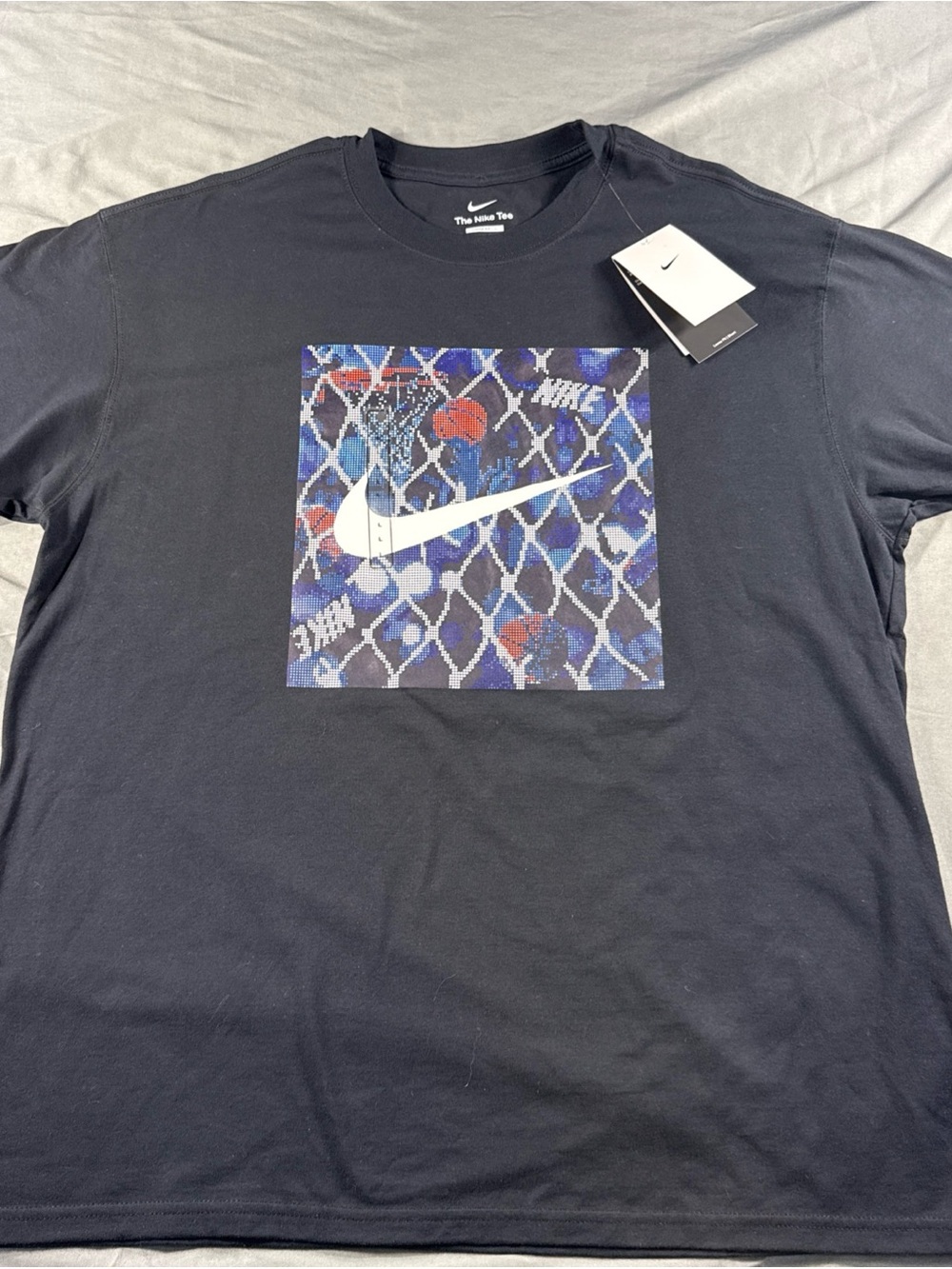 Nike Black Short Sleeve Tee with Blue-Patterned Swoosh Graphic